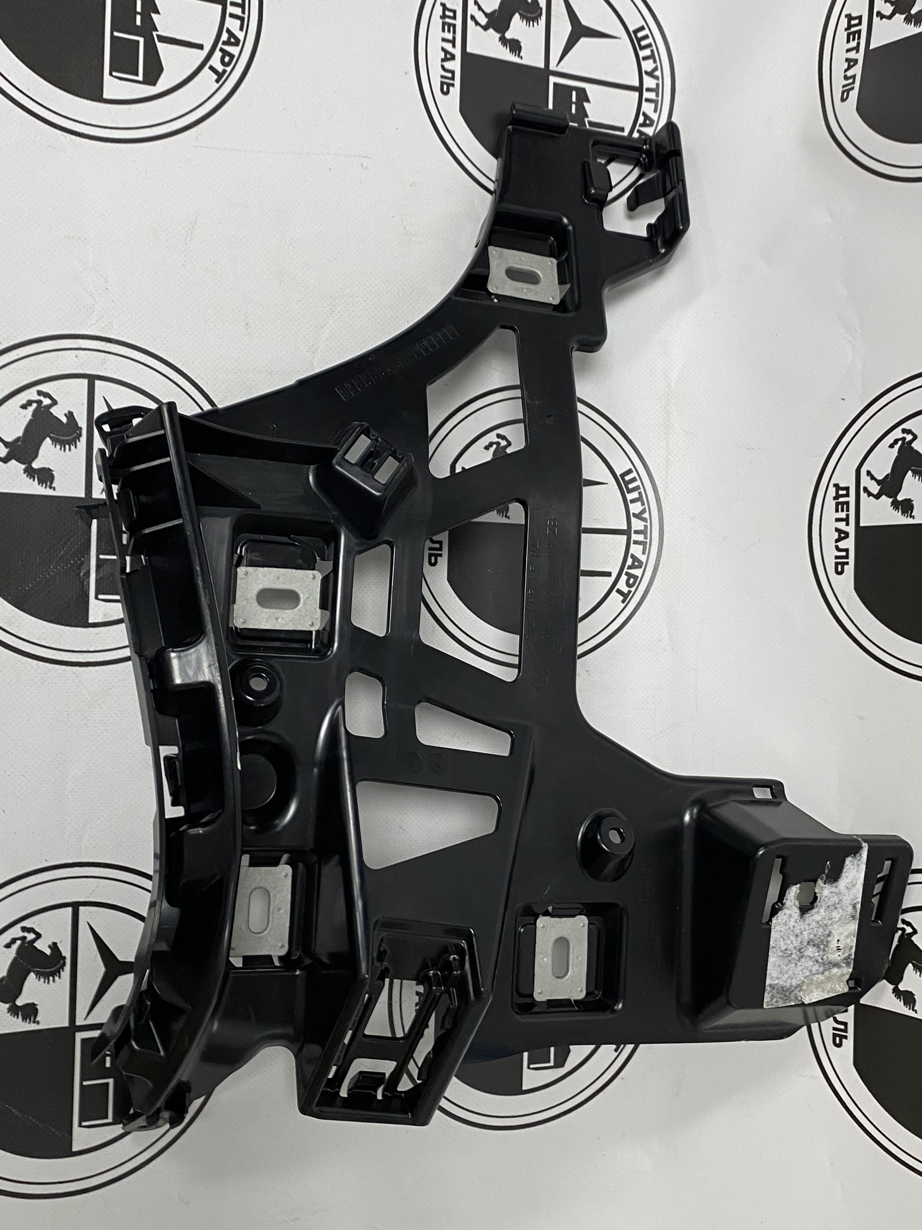 Кронштейн заднего бампера левый Mercedes-Benz A2148808503